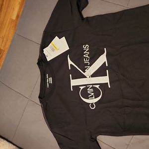 Boys black t-shirt with calvin klein jeans logo in white and silver